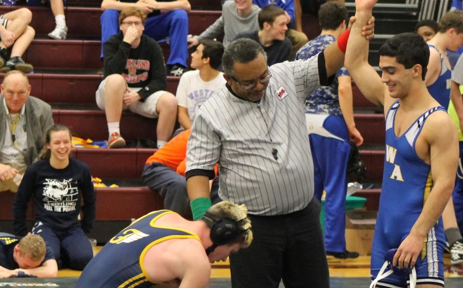 Pinning Opponents to the Mat and Ribbons to his Chest