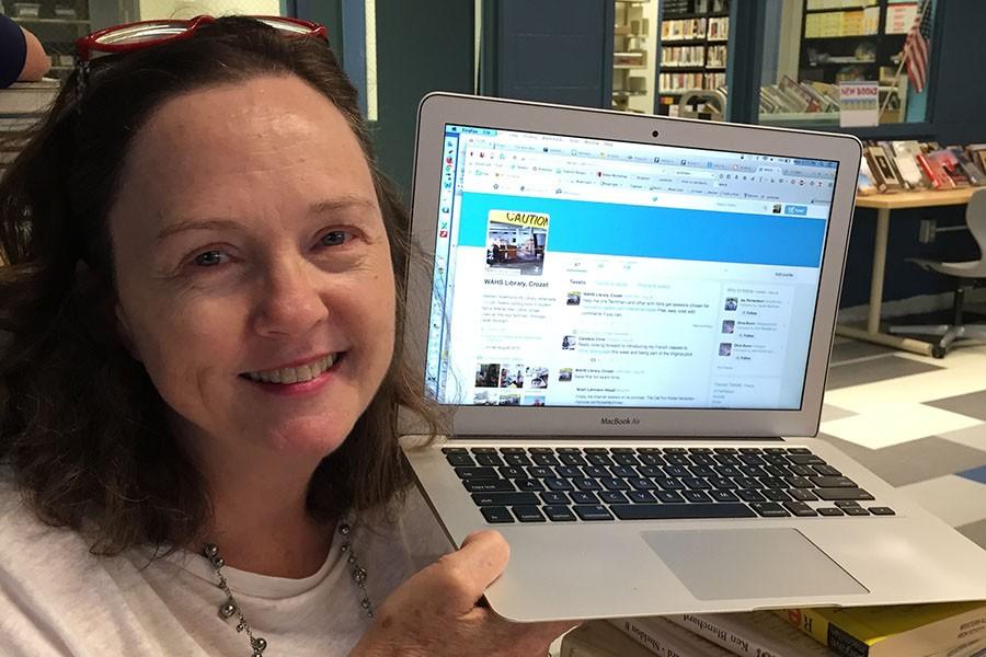 Librarian Melissa Techman poses with new library Twitter page