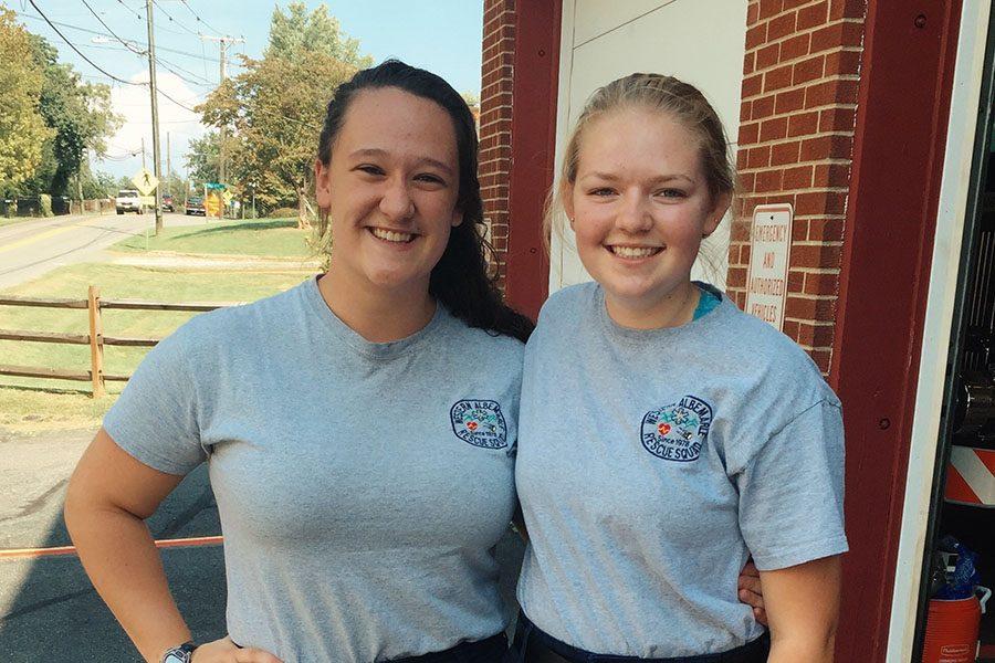 Catherine, left, with fellow senior Grace Foster at the rescue squad center