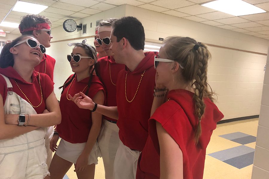 Seniors prepare to surprise an unsuspecting student with a singing valentine. (Picture from left to right) Abby Zimmerman, Charlie Reichart, Jane Romness, Teo Rampini, Johnny Riordan, Jed Strickland , and Savannah Wilson.