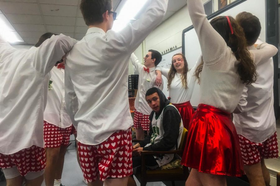 A senior group sings Accidentally in Love  by Counting Crows for senior Angelo Garono.