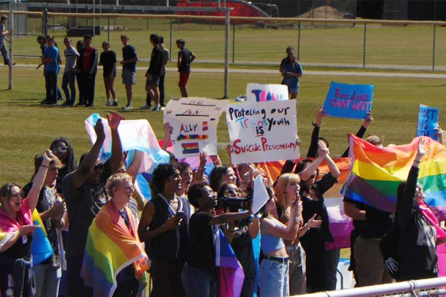 Across the state, students, like these at Princess Anne High School in Virginia Beach, organized walkouts to protest Youngkin’s new model policies. 
