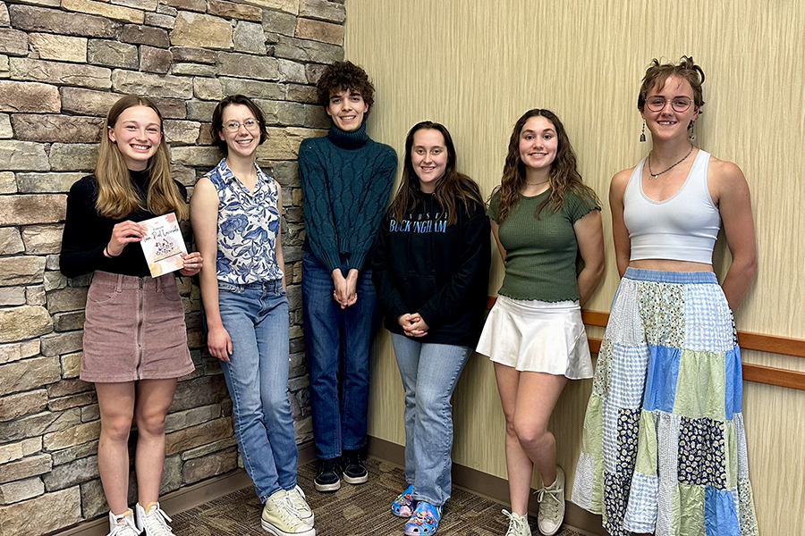 Teen Poet Laureate Sadie Adams (left),with fellow poets   Lillian Davis, Cal Hughes, Rachael Pond, Zoe Farris, and Cal Dagner (left to right).