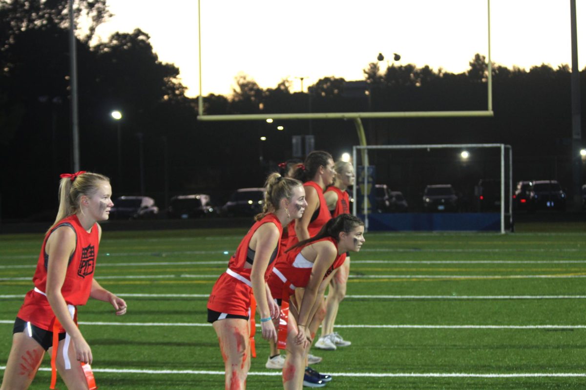 The senior team gets in position for the game to start. (left to right): Molly Streit, Chloe Gates, Emily See, Sophia Garono, and McLean Stokes.