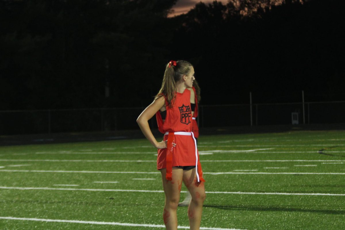 Senior Ella Pinto waits on the field as the refs make a call.