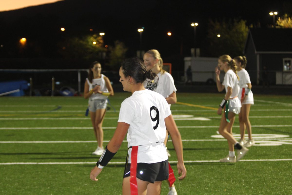 Sophomore Kennedy MacCleery jogs back to the line of scrimmage.