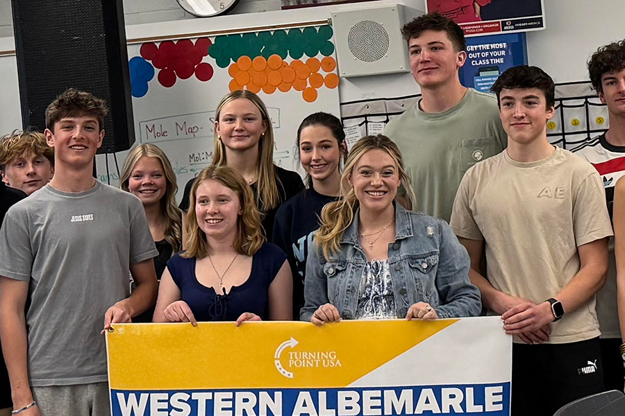 Isabel Brown spoke on abortion as TPUSA’s second guest speaker. (L to R. Back row: Royceton Jewell, McKenna Hinson, Margaret Camblos, Arabella Rhodes, Jack Camblos, John
van Yperen. Front row: Noah Coffin, Olivia-Kate Crombie, Isabel Brown, Ollie Woodrow.)